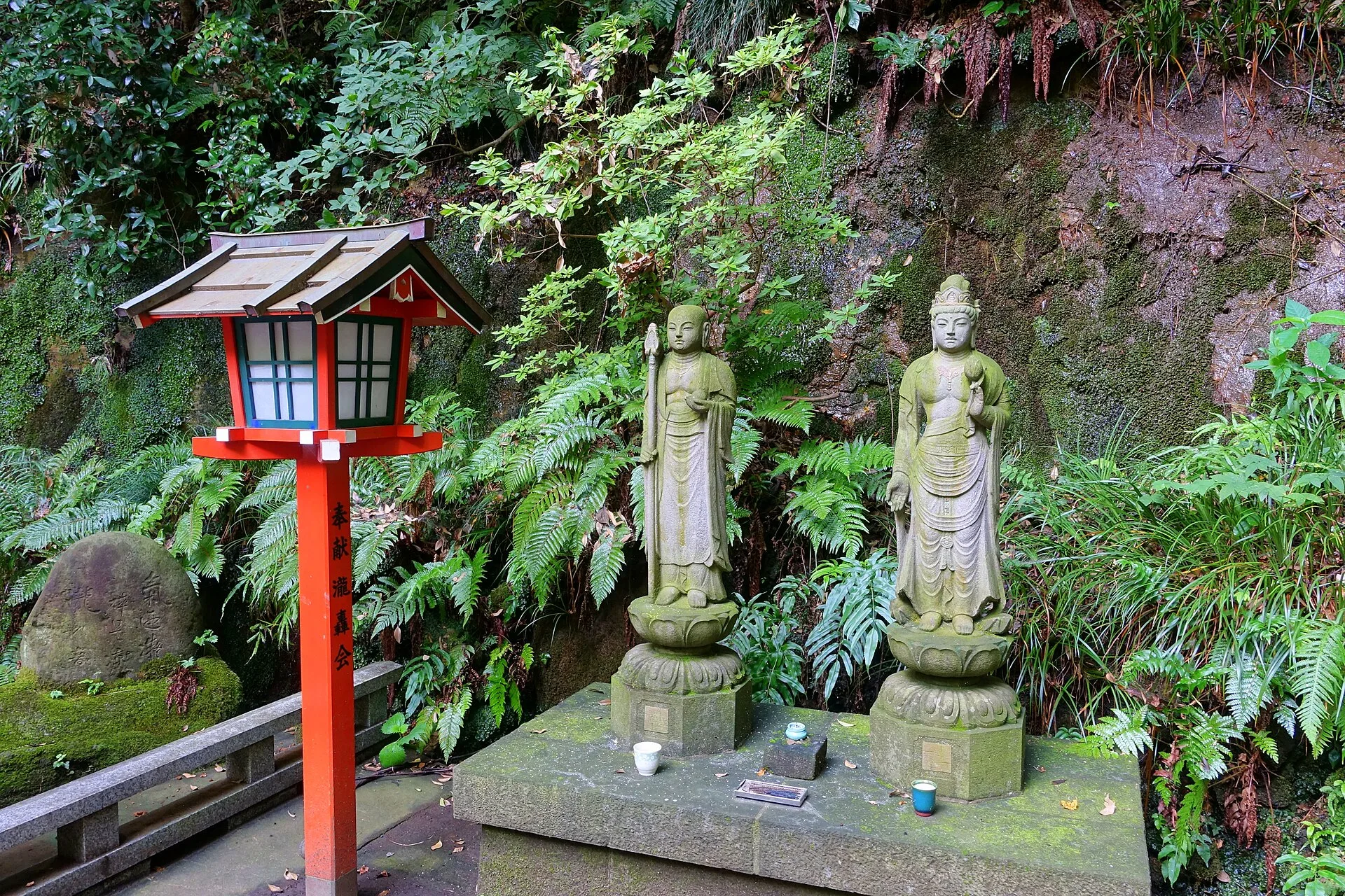 Fudo no Taki waterfall surrounded by trees in Todoroki Valley, Tokyo